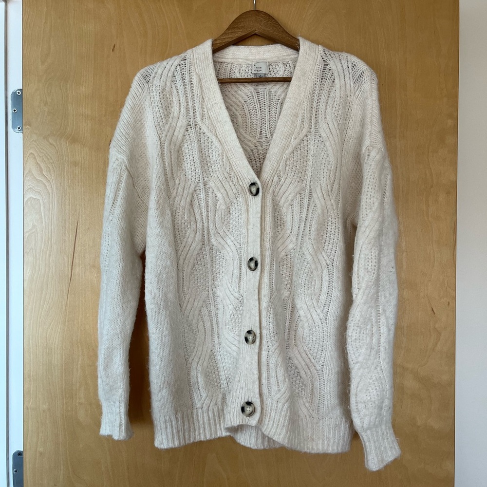 Long cream cable knit button up cardigan